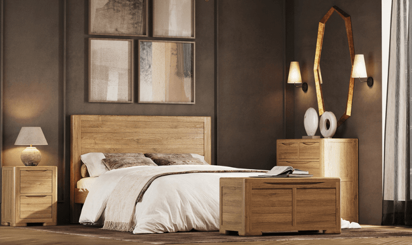 Modern bedroom with a warm oak wood bed, matching furniture, soft beige accents, and stylish wall art, creating a cosy and inviting space.