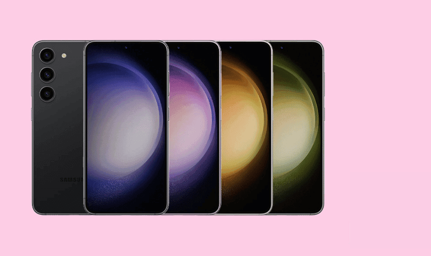 A selection of mobile phones lined up on a pink background