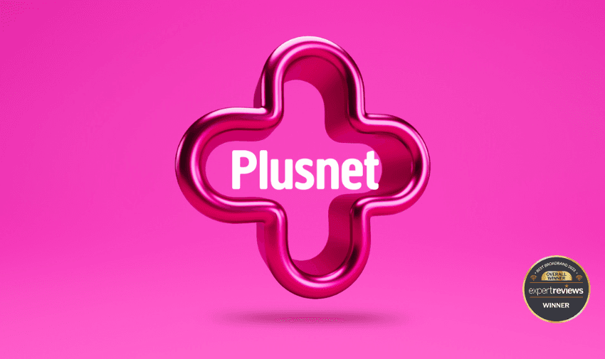 A bold pink Plusnet logo shaped like a cross with the text "Plusnet" inside, set against a vibrant pink background with an "Expert Reviews Winner" badge in the corner