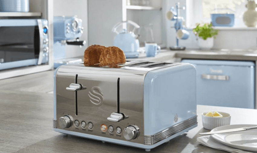 A silver Swan four slice toaster