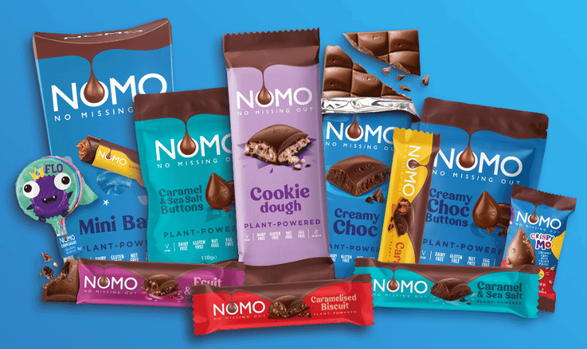 A selection of NOMO chocolate products on a blue background