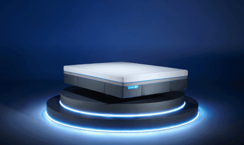 A Simba Hybrid® Ultra Mattress sat on a podium. Thirteen layers of remarkable natural materials and most advanced signature tech.