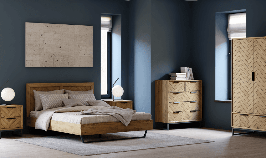 Contemporary bedroom with oak wood furniture, navy-blue walls, large windows, and geometric patterns, giving a modern and spacious feel.