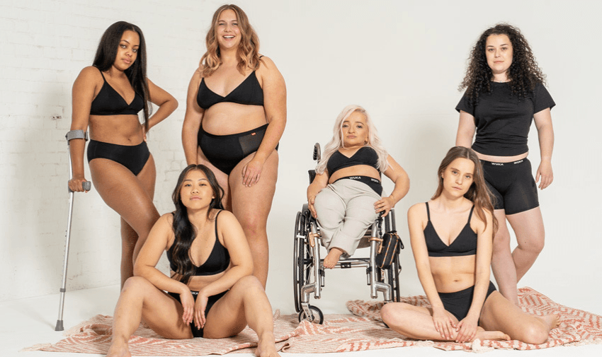 A diverse group of women, including one with crutches and another in a wheelchair, wearing WUKA lingerie, representing inclusivity and empowerment. Featuring Purpl's accessible offers and discounts for adaptive and sustainable fashion in the UK.