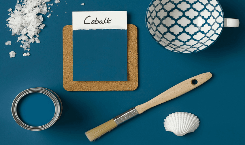 paint sample for Cobalt blue paint with a paintbrush and an open paint pot