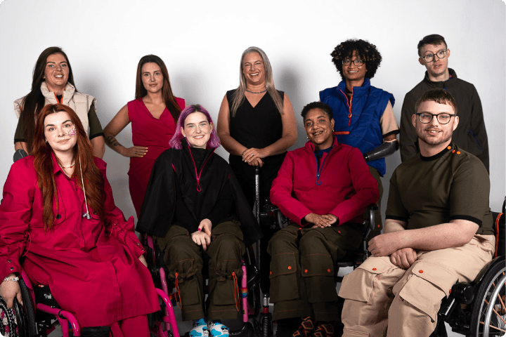 A group of disabled people in a range of adaptive clothing from Intotum