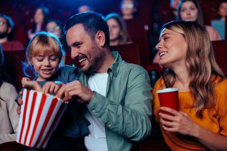 Family enjoying cheaper cinema tickets with The Cinema Society, disabilities, long term health conditions and Purpl discounts.